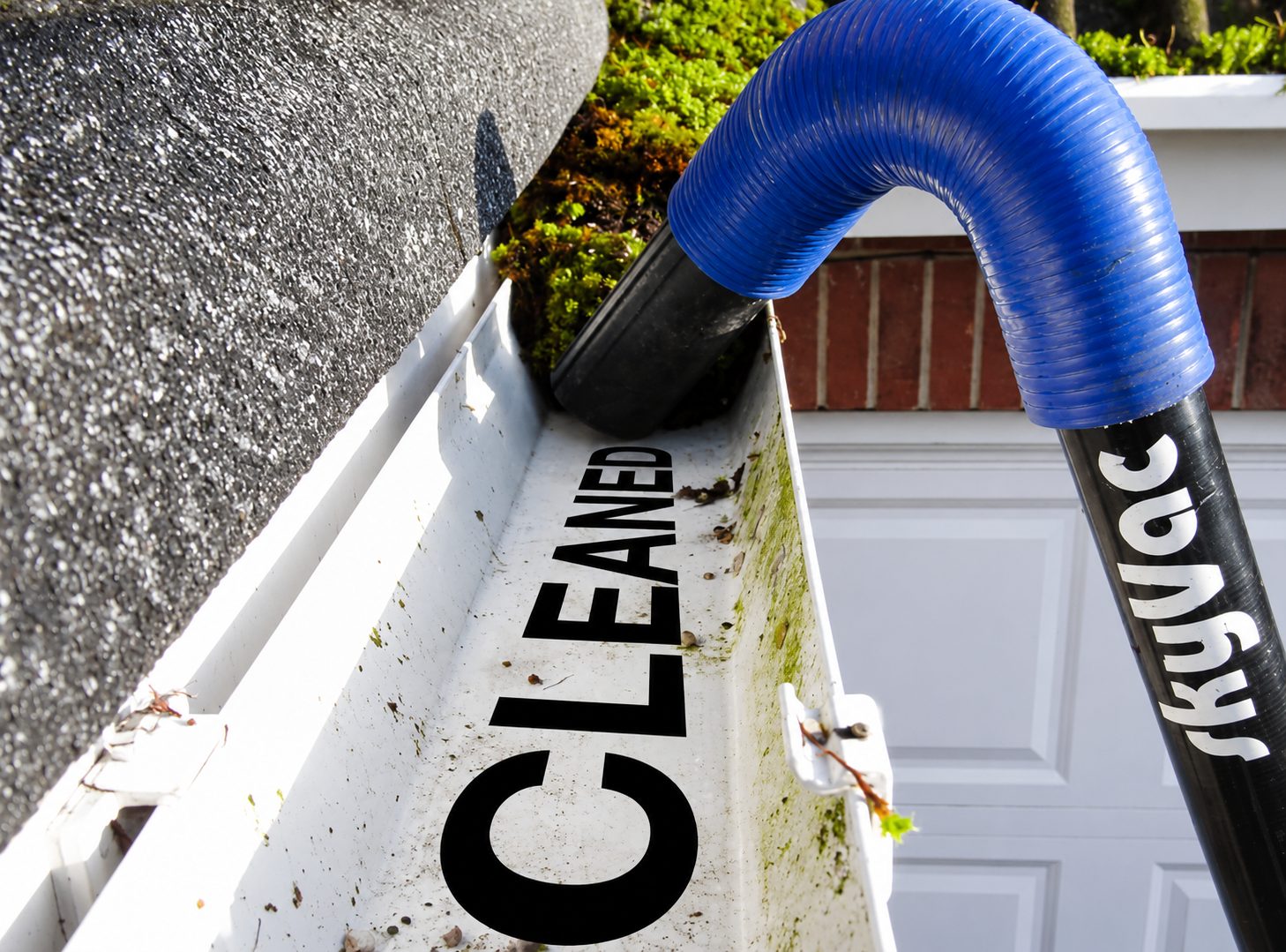 Freshly cleaned gutter with vacuum system